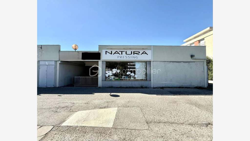 Vente pressing centre commercial de Chassieu 